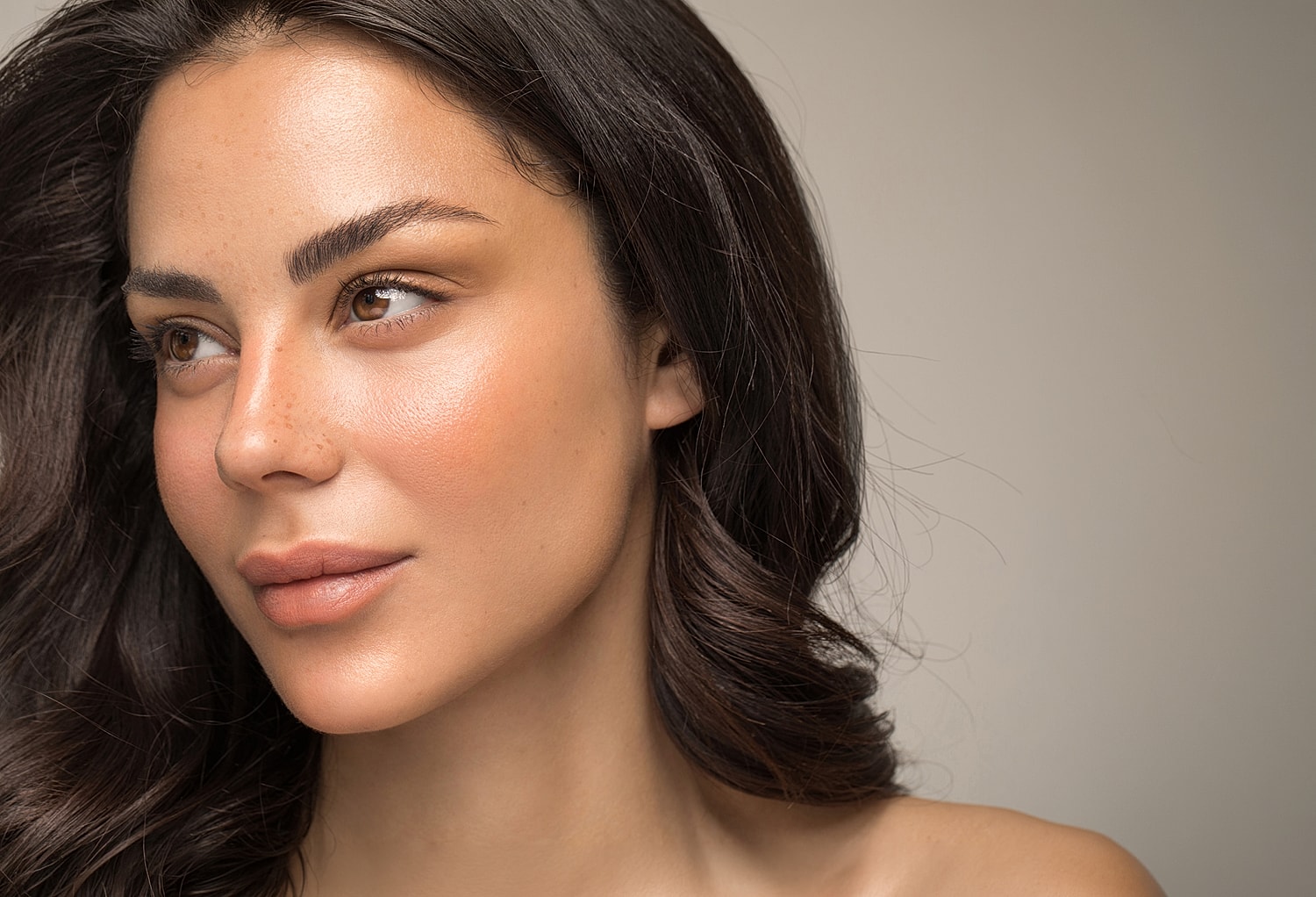 Close-up portrait of a Lafayette facial plastic surgery model with natural beauty.